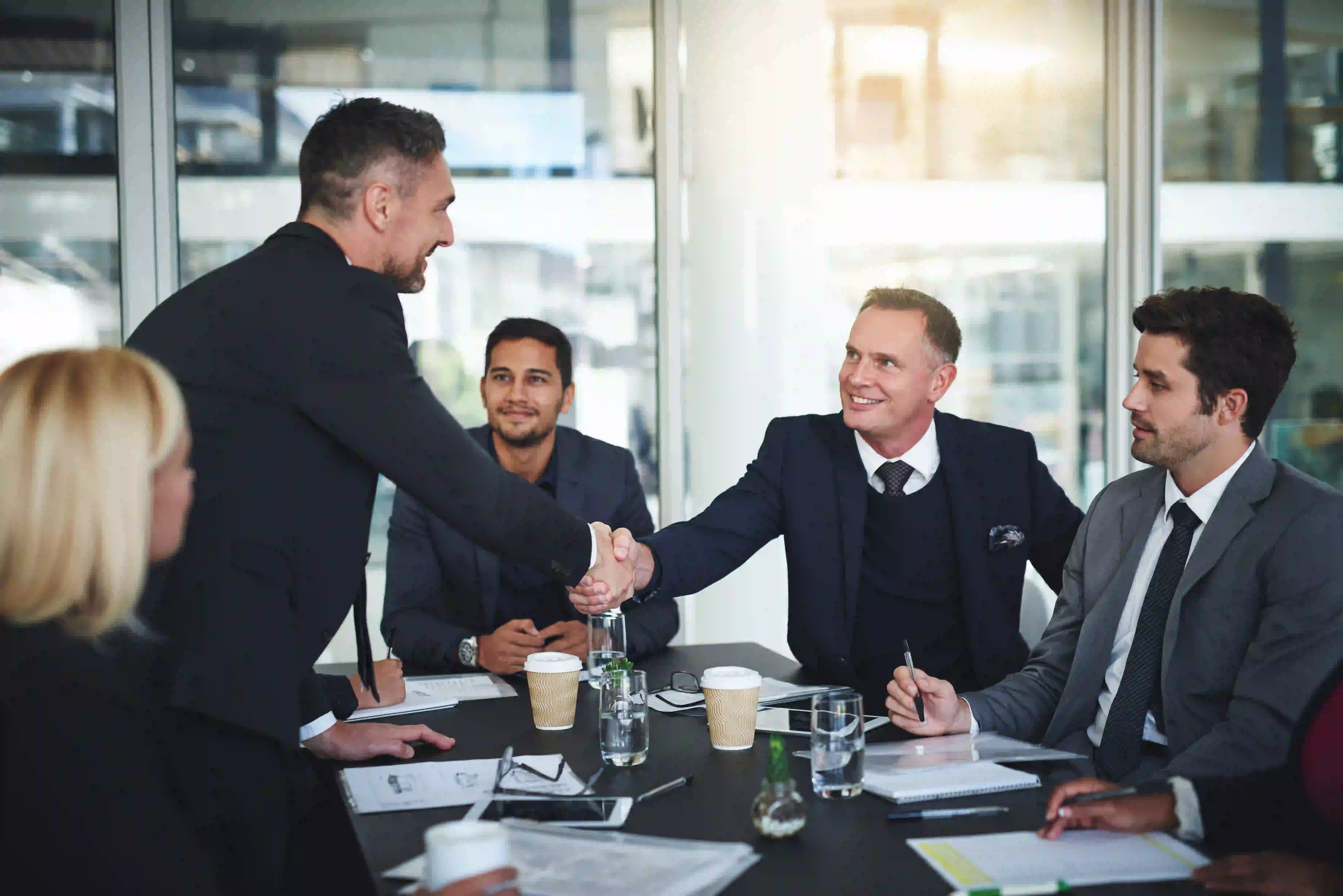 Shot Of Two Cheerful Businessmen Shaking Hands In 2025 04 06 10 17 30 Utc (1)